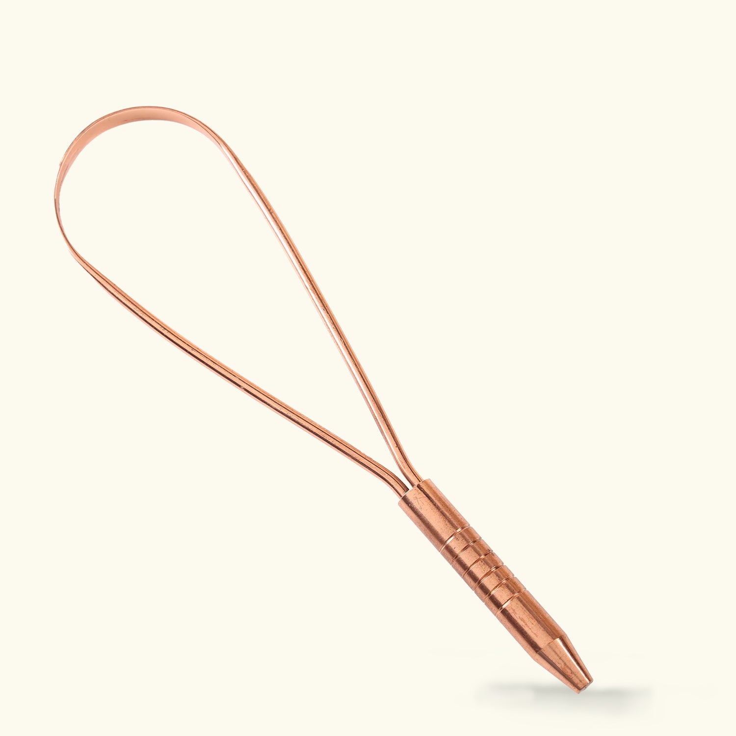 A luxurious Ayurvedic copper tongue scraper from Art of Vedas, designed to gently remove toxins and impurities from the tongue, promoting a healthier mouth and body.